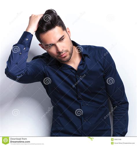 Fixing synonyms, fixing pronunciation, fixing translation, english dictionary definition of fixing. Closeup Of Young Man Fixing His Hair Royalty Free Stock ...