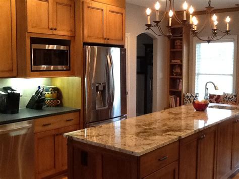 Maybe you would like to learn more about one of these? Maple cabinets - honey oak stain on perimeters and darker ...