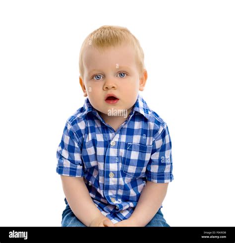 Blue Eyed Baby Boy In A Plaid Shirt Stock Photo Alamy