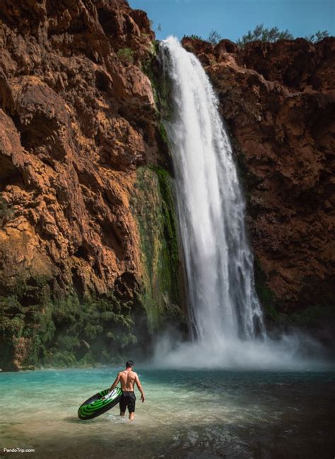 Swim Under The Havasu Falls In The Grand Canyon Usa