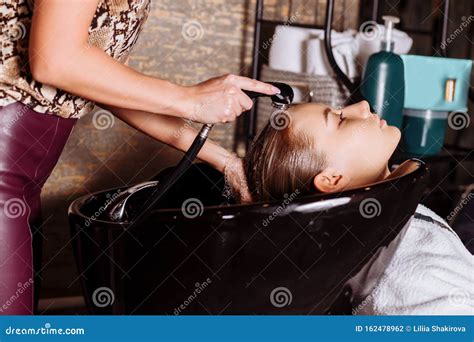 Portrait Of Women Which Wash Hair In A Beauty Salon Stock Photo Image