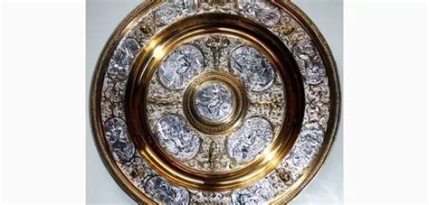 What is the wimbledon trophy made of? At Wimbledon, why does the women's champion receive a plate while the men's champion receives a ...