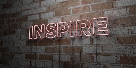 Inspire Glowing Neon Sign On Stonework Wall 3d Rendered Royalty