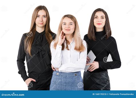 Three Smiling Business Women Standing In A Row Isolated On White