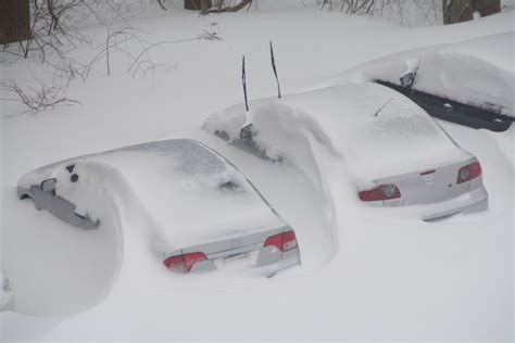 Cars Buried In Snow Alon Tal Flickr