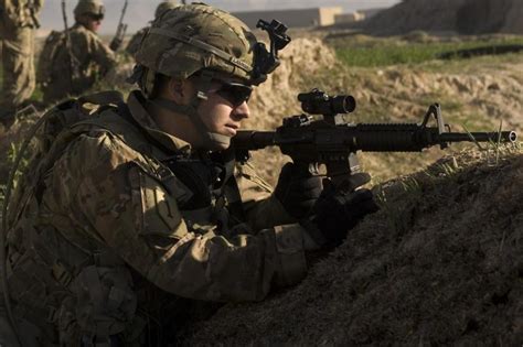 Us Soldiers From 2nd Battalion 2nd Infantry Regiment On Patrol In
