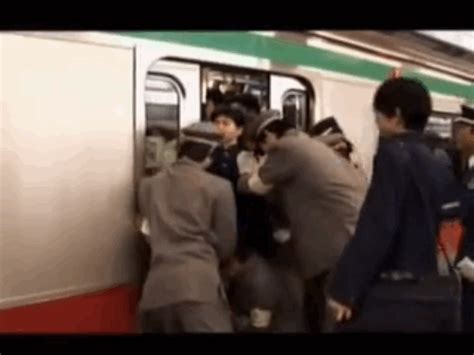 or anyone in tokyo who has to be squeezed into the subways japan train station funny