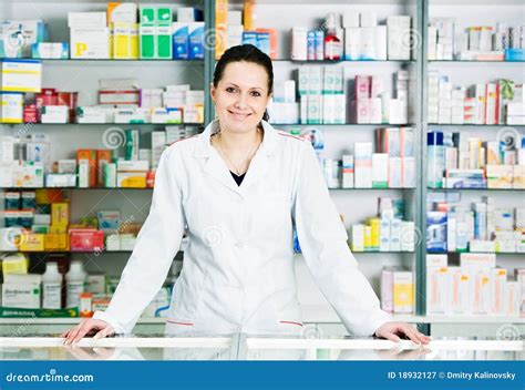 Pharmacy Chemist Woman In Drugstore Royalty Free Stock Photography
