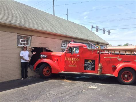 Antique Fire Truck Crashes Into West Toledo Tattoo Studio