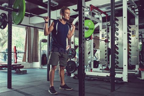 Man Doing Squats With Barbell Stock Image Image Of Active Healthy