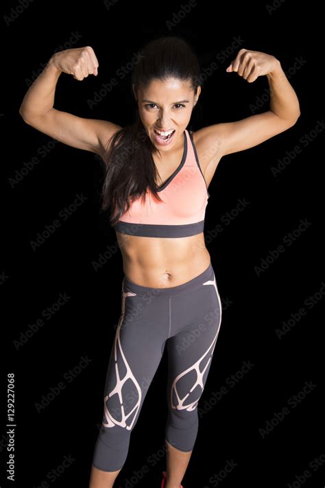 Latin Sport Woman Posing In Fierce And Badass Face Expression With Fit Slim Body Stock Foto