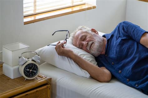 Premium Photo Side View Of Old Man Sleeping On Bed
