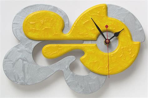 Unique Contemporary Modern Art Wall Clock Designed To Be Hanged In 4
