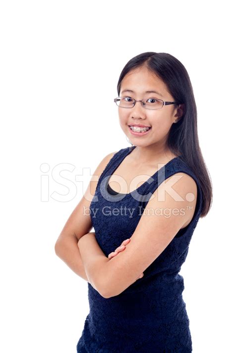 Asian Girl In Braces Striking A Pose Stock Photo Royalty Free