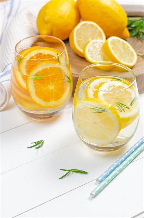 Preparation Of The Lemonade Drink And Orange Juice Lemonade In The Jug