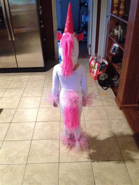 This unicorn tail would be perfect as part of a halloween costume or for playing dress up. Homemade unicorn costume for girl | Unicorn costume kids, Unicorn halloween costume, Little girl ...