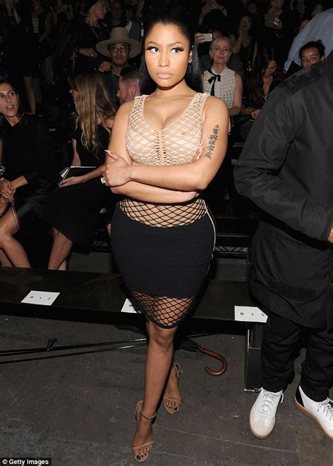 Nicki Minaj Flaunts Her Killer Curves In Barely There Dress As She Puts On A Busty Display