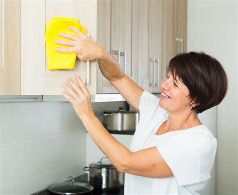 Mature Woman Cleaning Stock Image Image Of Protective 219165229