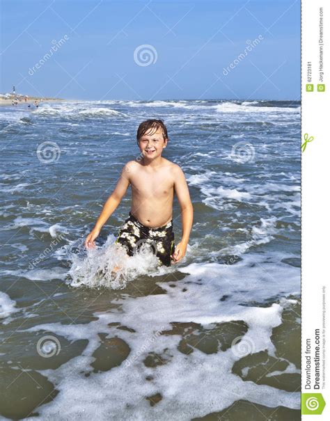 Boys Enjoying The Beautiful Ocean And Beach Stock Image Image Of
