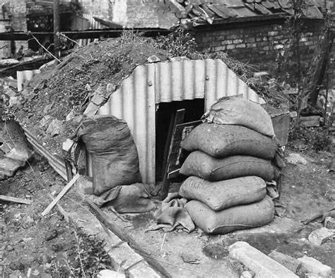 An Anderson Air Raid Shelter In The Back Garden Of A