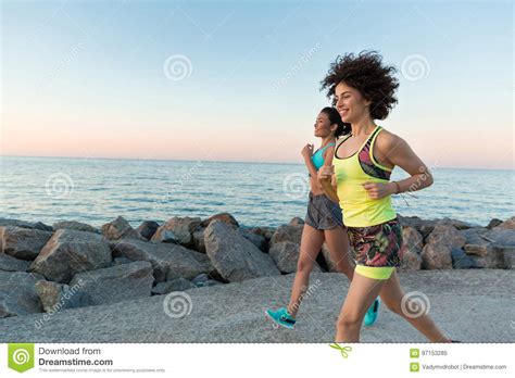 Happy Smiling Fitness Women Jogging Together Stock Image Image Of