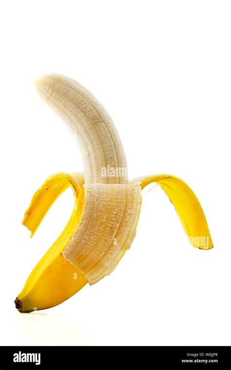 One Peeled Standing Banana On White Background Stock Photo Alamy