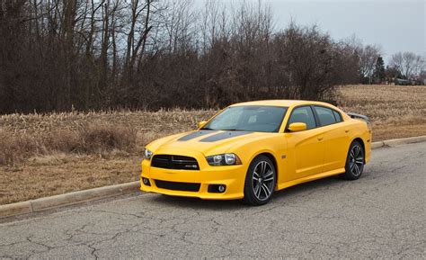 Our car experts choose every product we feature. 2012 Dodge Charger SRT8 Super Bee Test | Review | Car and ...