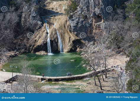 Close Up Turner Falls With People Visiting On Honey Creek In The