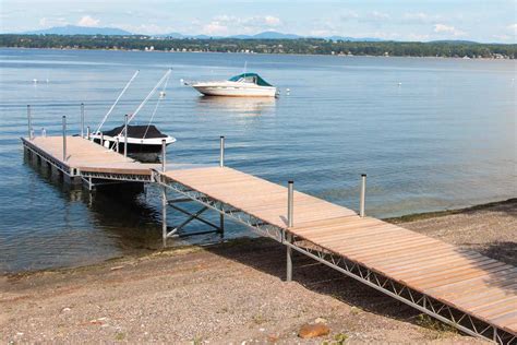 Custom Designed Steel Truss Floating Docks For Tidal Settings — The