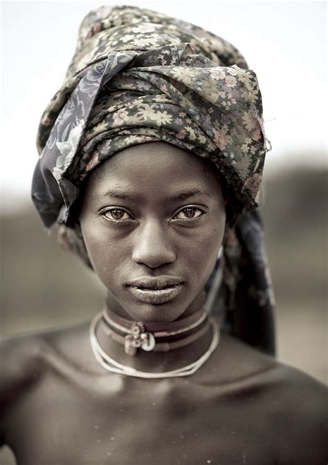 mucubal people angolan enduring tribe and their fashionable ompota headdress