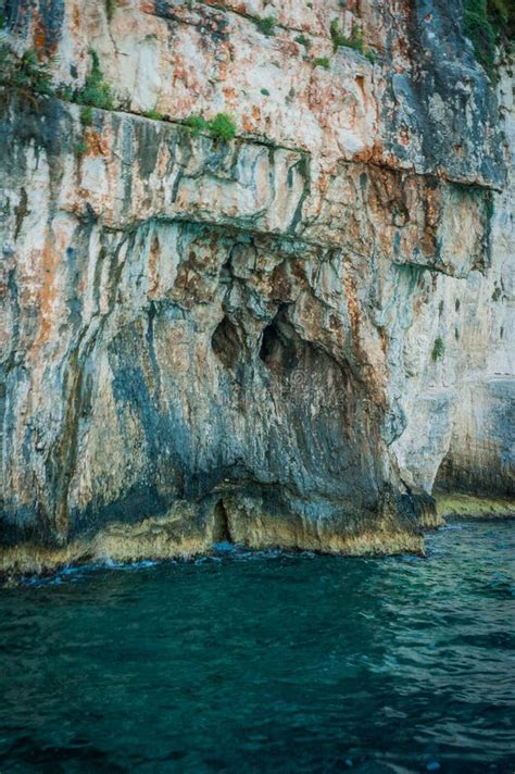 Greece Zakynthos August 2016 Rocks Caves And Blue Water Stock Image