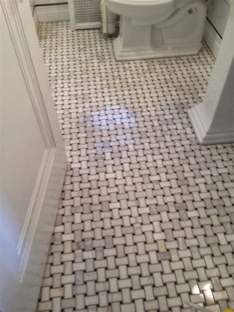 White and gray mosaic bathroom floor tiles steal the show in a remodeled bathroom featuring a salvaged wood washstand, white porcelain sink, and subway tiled walls. Remodeling a bathroom in an old pittsburgh home — Bathroom ...