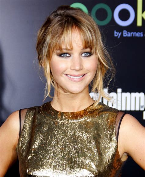Jennifer Lawrence Up Style With A Woven Chignon And Playful Bangs