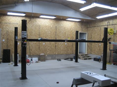 The cables and hydraulic hoses are routed under a base plate between the two posts. Car Lifts For 10' Ceilings - Minimum Ceiling Height For A 4 Post Lift Corvetteforum Chevrolet ...