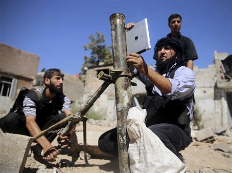 photo syria rebels with mortar and ipad business insider