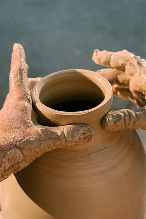 Person Making Clay Pot · Free Stock Photo