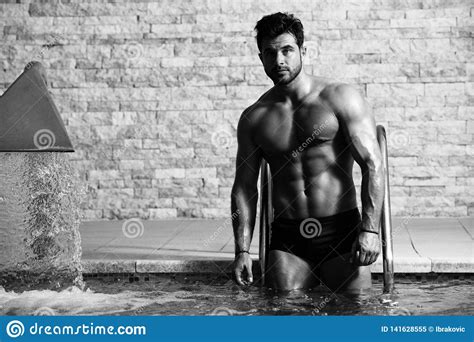 Young Looking Macho Man At Hotel Indoor Pool Stock Image Image Of