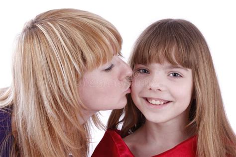 Mother Is Kissing Her Happy Daughter Stock Photo Image Of Daughter