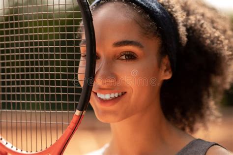 Smiling Cute Female Tennis Player With A Racket In Hands Stock Image