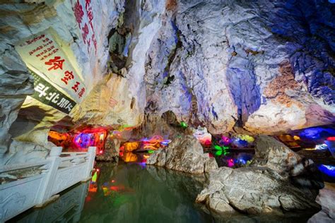 The Beautiful Seven Star Cave With Colorful Lights And Reflection At