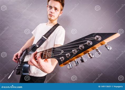 Guy Playing Electric Guitar