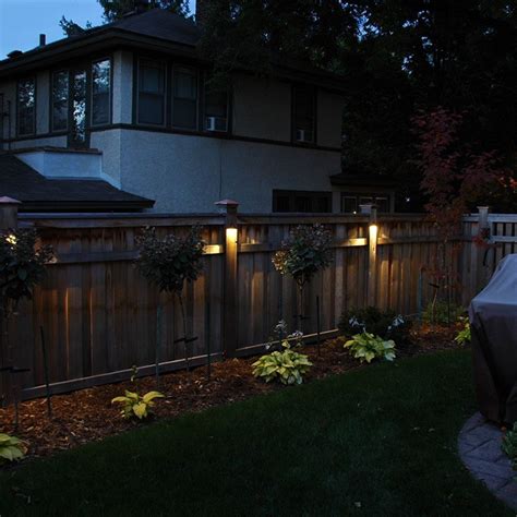 Forgo table lamps on the nightstands, and position wall sconces beside. Fence LED Lights Image Gallery | Outdoor Fence Lighting
