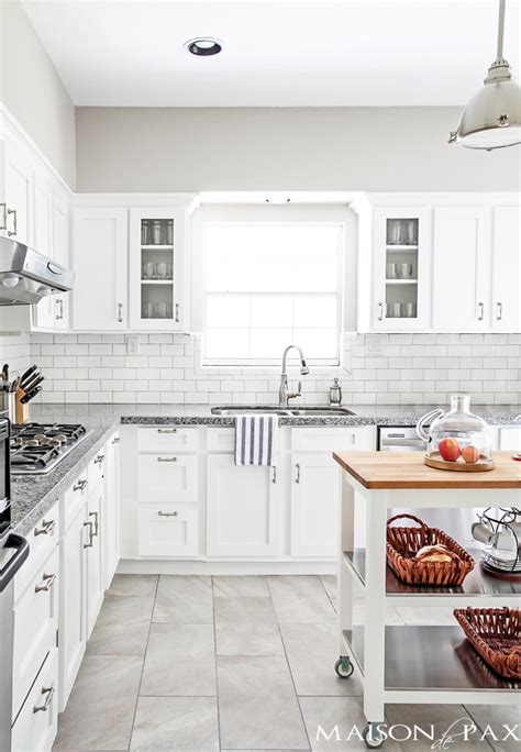 Popular white kitchen cabinets gleam with pizzazz, do you agree? Source List for Classic White Kitchen - Maison de Pax