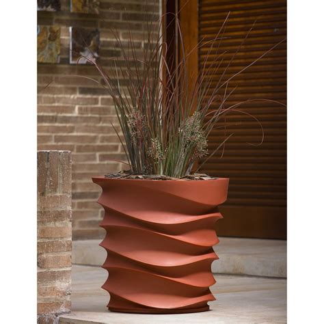Modern outdoor planters, such as patio planter boxes, are often found dotting porches, courtyards, and pool decks. Oval Resin Eye Am 25-inch Planter Alpine White | Large ...