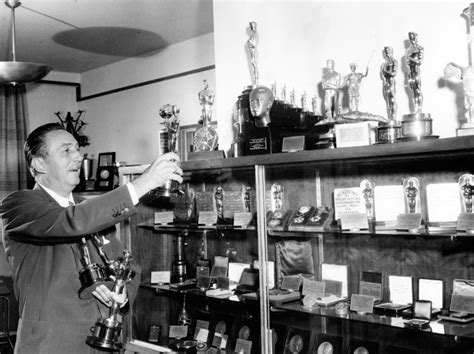 Walt Disney With All His Awards Oscars Disneyexaminer