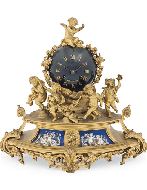 A French Porcelain Mounted Gilt Bronze Mantel Clock Henri Marc Paris
