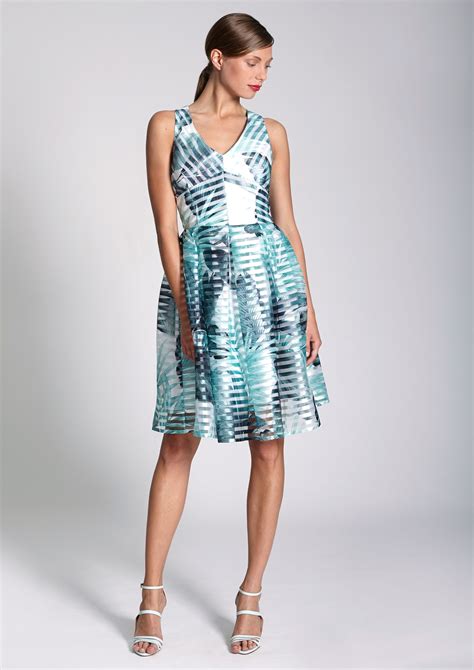 Aqua green voile with floral print in pastel shades. Aqua green printed dress
