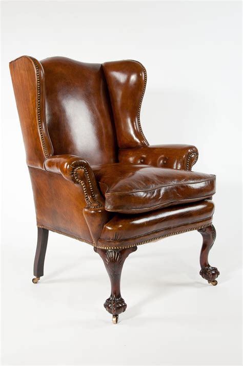 Only genuine antique leather wing chairs approved for sale on www.sellingantiques.co.uk. 19th Century Walnut Leather Wing Chair at 1stdibs
