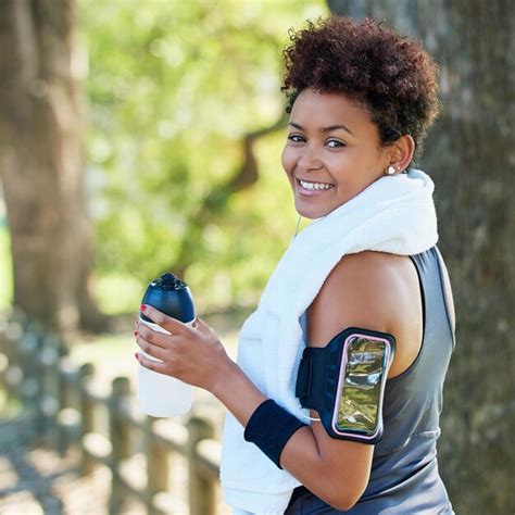 Premium Photo Dont Forget To Stay Hydrated Portrait Of A Sporty Young Woman Out For A Run