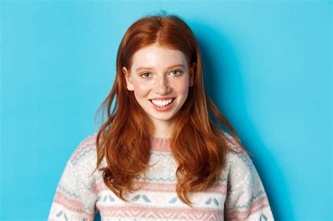 Free Photo Close Up Of Cute Redhead Girl In Sweater Smiling Happy At